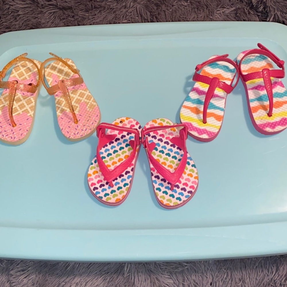 Three pairs of flip flops